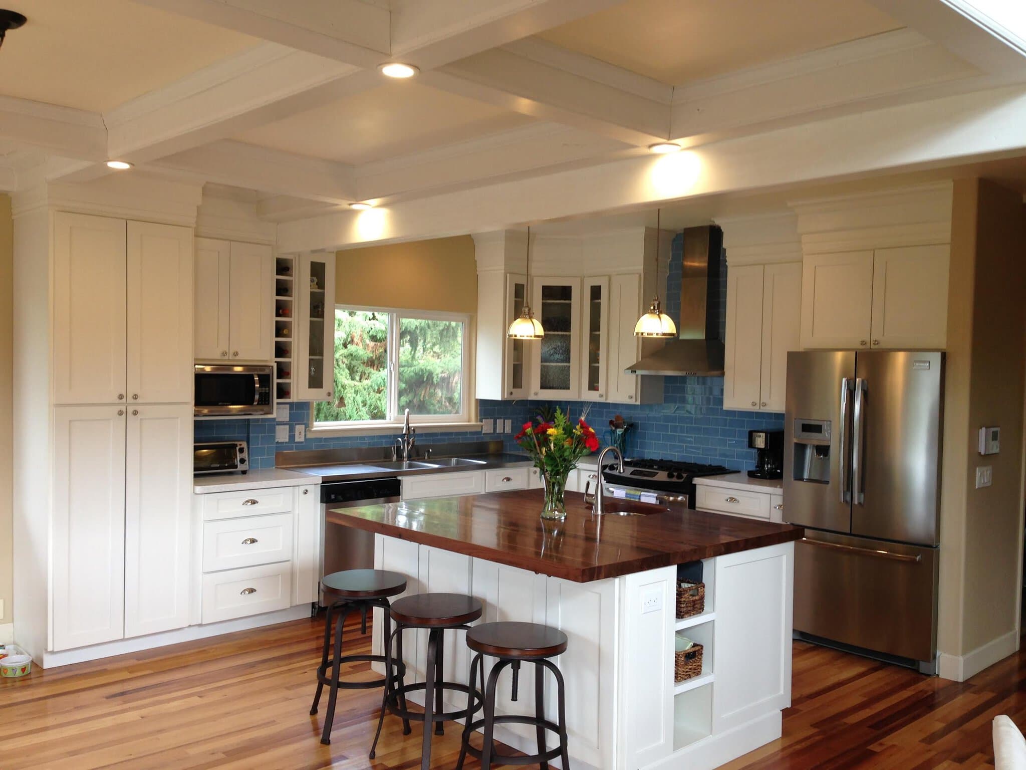 Walnut island countertop with eased edge profile and conversion varnish